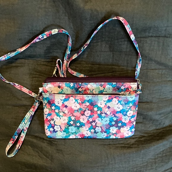 Handbags - Blue floral print crossbody bag.  Wrist and crossbody straps included